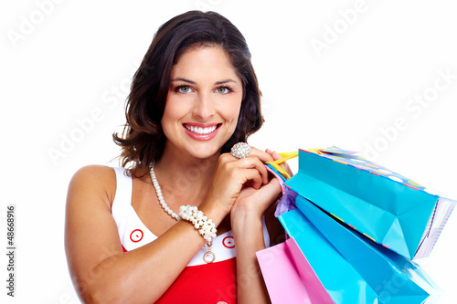 Photo: Beautiful woman with a shopping bags. Beautiful woman with a shopping bags.