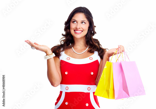 Photo: Beautiful woman with a shopping bags. Beautiful woman with a shopping bags.