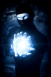 Man witch with Ball from frozen ice
