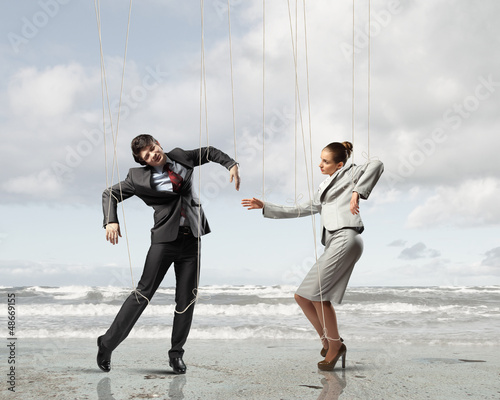 Photo: Puppet businesspeople Puppet businesspeople