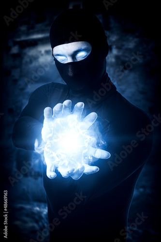 Photo: Man witch with Ball from frozen ice Man witch with Ball from frozen ice