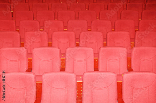 Photo: rows of chairs in a theater rows of chairs in a theater