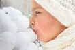 Photo: Girl kissing snowballs Girl kissing snowballs