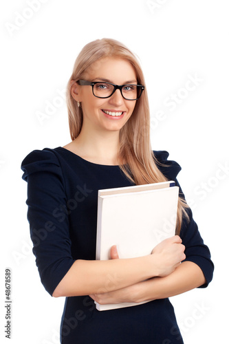 Photo: Student holding books Student holding books