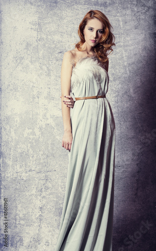 Photo: Beautiful woman posing in a long dress Beautiful woman posing in a long dress