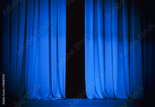 Photo: blue stage curtain slightly open blue stage curtain slightly open