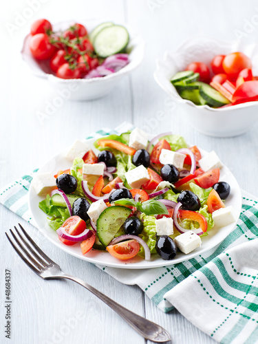 Photo: Greek Salad on Kitchen Table Greek Salad on Kitchen Table
