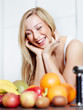 Pretty girl in the kitchen loves healthy food to lose weight