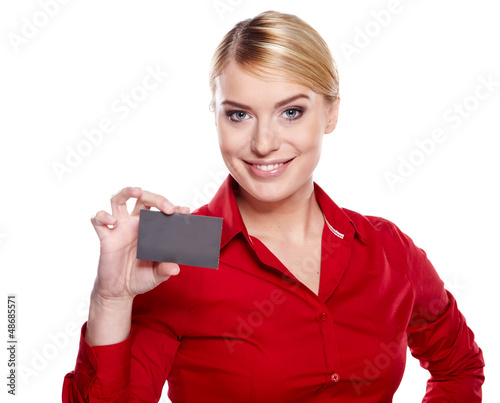 Photo: Businesswoman holding credit card. Isolated on white Businesswoman holding credit card. Isolated on white