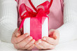 Woman showing  gift