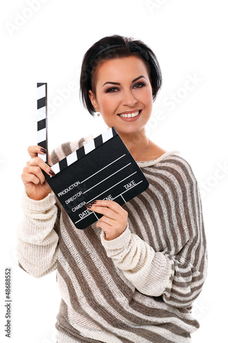 Photo: Young happy woman holding a clapboard Young happy woman holding a clapboard