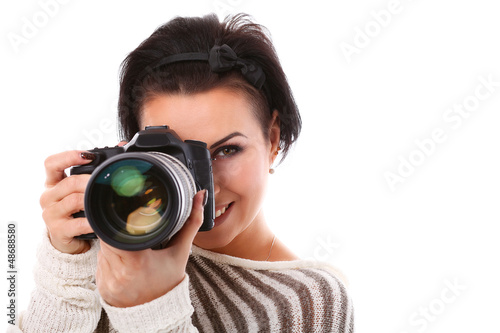 Photo: Young happy woman with camera Young happy woman with camera