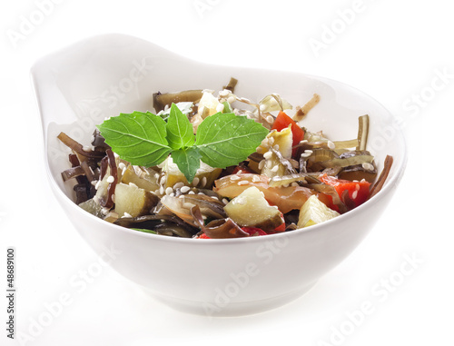 Photo: Salad of seaweed isolated on white background Salad of seaweed isolated on white background