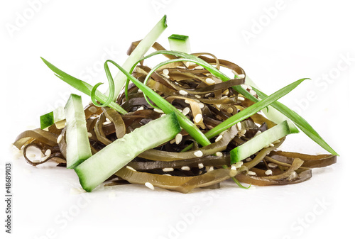 Photo: Salad of seaweed isolated on white background Salad of seaweed isolated on white background