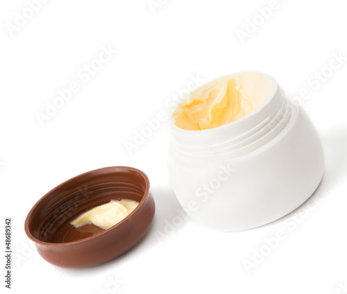 Photo: cosmetic cream in container cosmetic cream in container