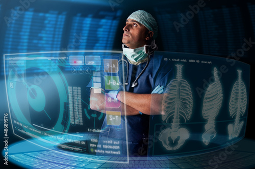 Photo: Doctor with screens Doctor with screens