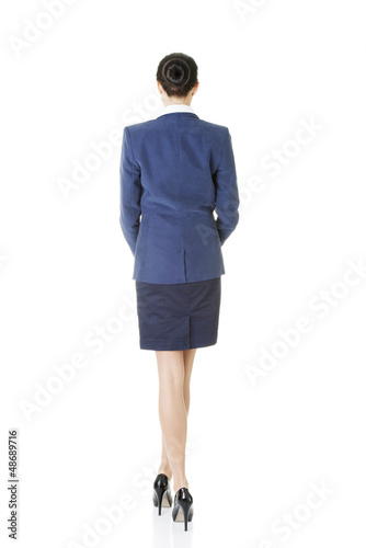 Photo: Rear view of young beautiful businesswoman Rear view of young beautiful businesswoman