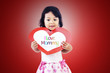 Cute girl give love card to mom