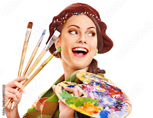 Photo: Female artist at work. Female artist at work.