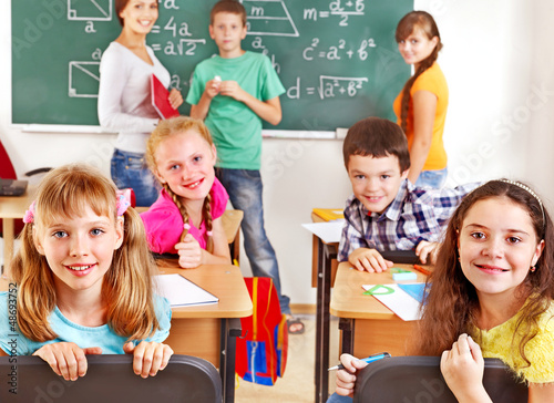 Photo: School child with teacher. School child with teacher.