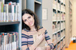 Pretty young woman in the library