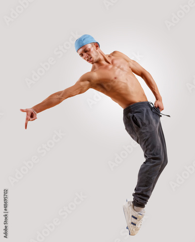 Photo: young man dancing hip hop young man dancing hip hop