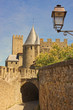 Back street and lantern in the old town of Carcassonne, France.