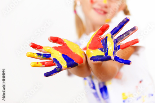 Photo: happy child with paint on the hands happy child with paint on the hands
