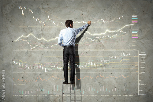 Photo: businessman drawing diagram businessman drawing diagram