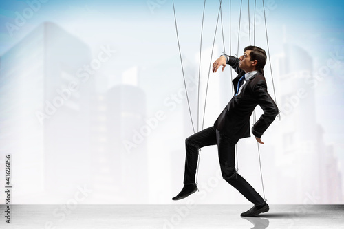 Photo: Puppet businessman Puppet businessman