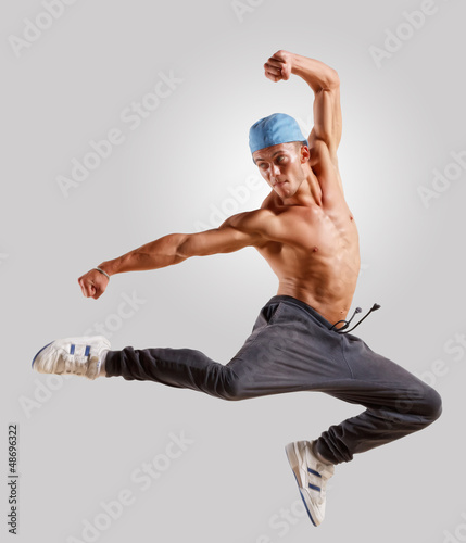 Photo: young man dancing hip hop young man dancing hip hop