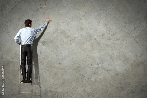 Photo: businessman drawing diagram businessman drawing diagram