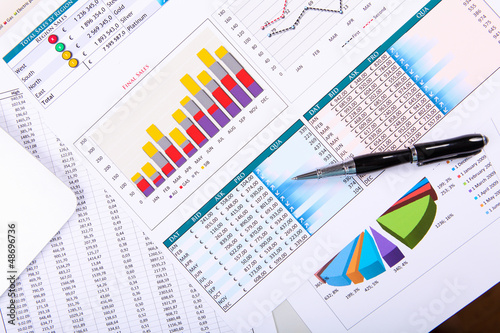 Photo: Financial papers on the table Financial papers on the table