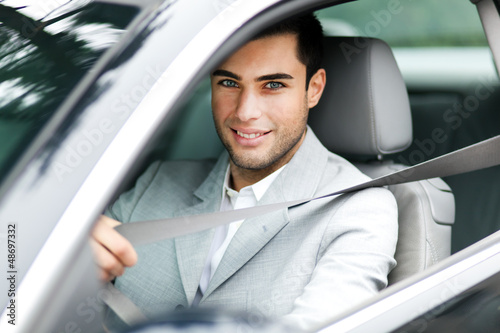 Photo: Man driving his car Man driving his car