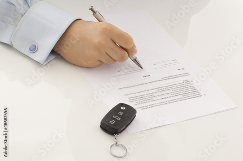 Photo: businessman signing contract businessman signing contract