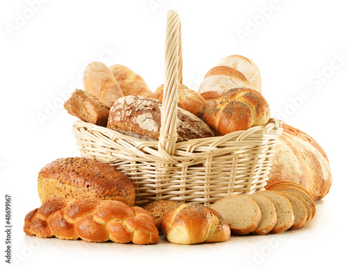 Photo: Composition with bread and rolls isolated on white Composition with bread and rolls isolated on white