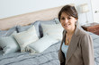 Photo: Woman in her bedroom Woman in her bedroom