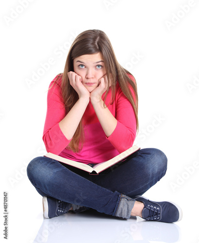 Photo: University student bored, frustrated and overwhelmed by studying University student bored, frustrated and overwhelmed by studying