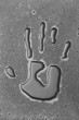 Handprint man out of the water