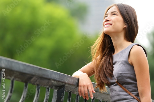 Photo: Business woman thinking in Central Park Business woman thinking in Central Park
