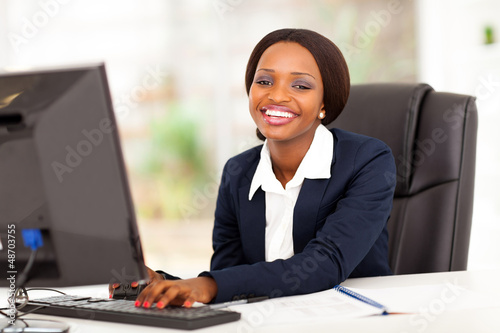 Photo: happy african american businesswoman working in office happy african american businesswoman working in office