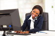 Photo: beautiful young african american businesswoman working in office beautiful young african american businesswoman working in office