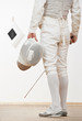 Photo: Fencer with mask rapier foil Fencer with mask rapier foil