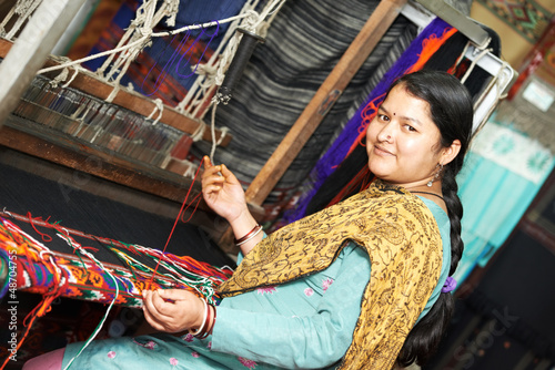 Photo: young indian woman weaver young indian woman weaver
