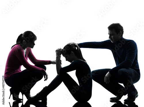 Photo: family father mother consoling daughter silhouette family father mother consoling daughter silhouette