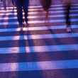 Crowd crossing the street in the crosswalk