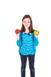 a young girl holding a delicious red and green apple