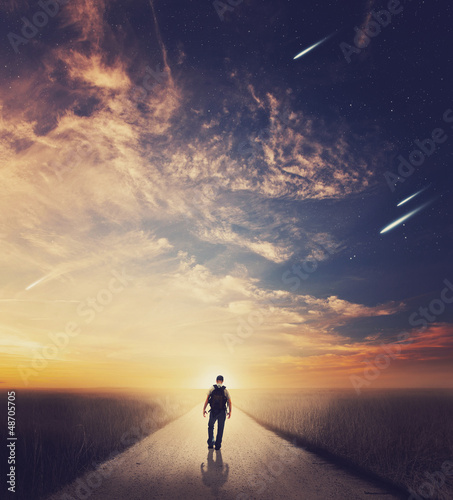 Photo: Man walking at sunset Man walking at sunset