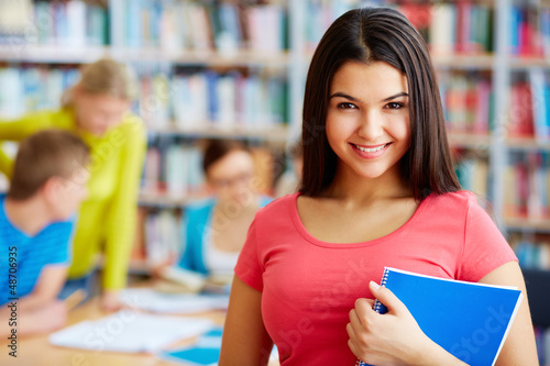 Photo: Student with copybook Student with copybook