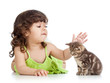 funny happy child playing with cat kitten